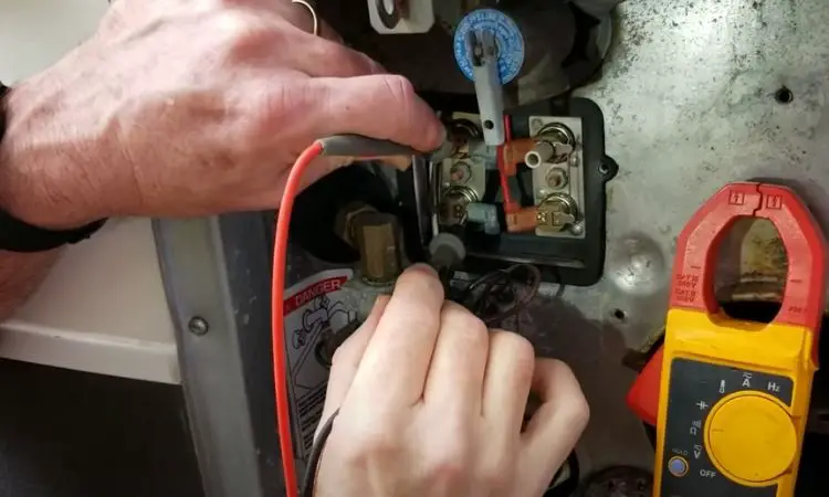 use a multimeter to test the suburban rv water heater thermostat's left side (electric) terminal