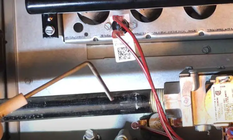 carbon build-up in the sensor of rheem tankless water heater