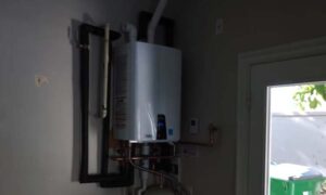 navien tankless water heater exhaust smells like gas